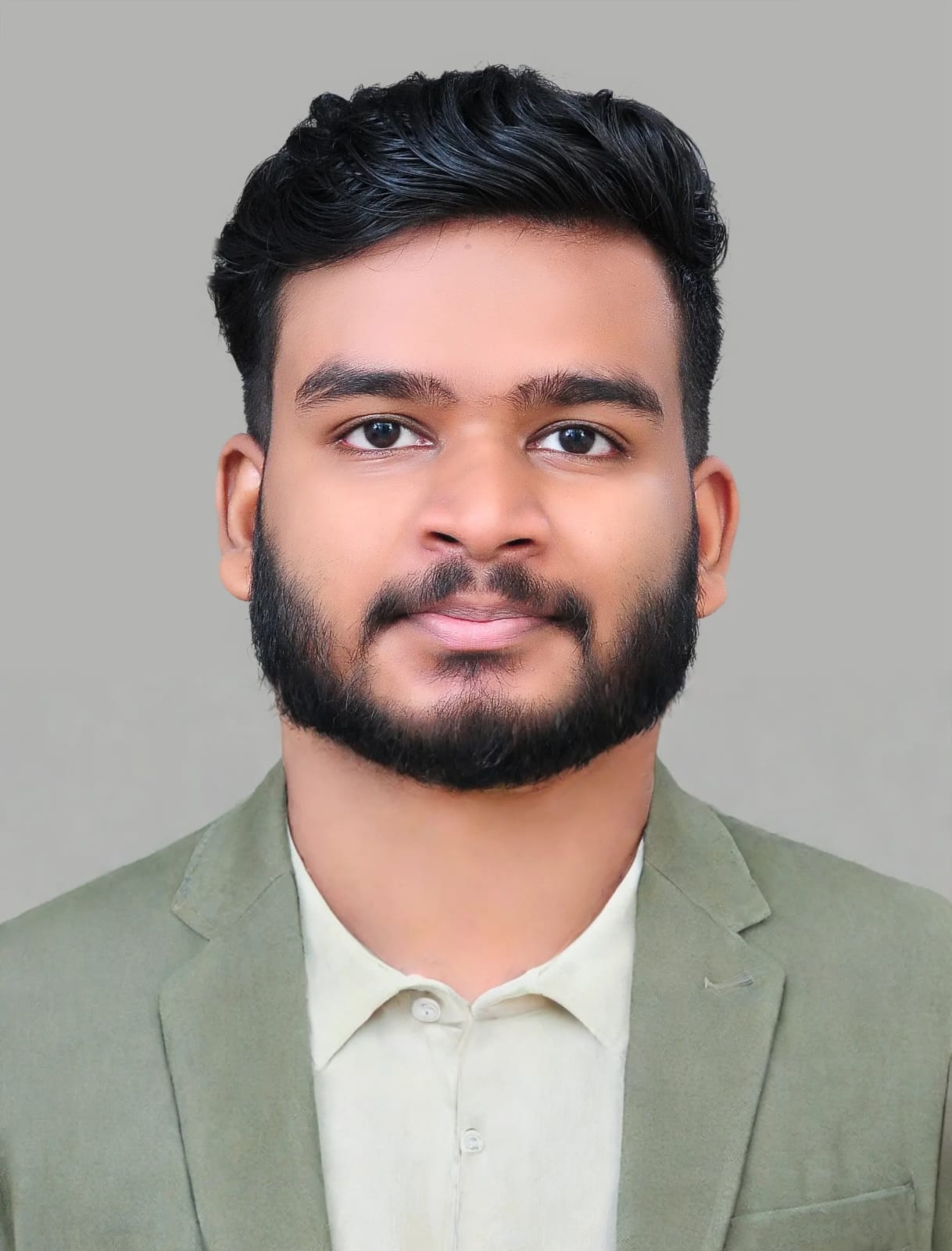 Vinayak Sabu in a formal blazer